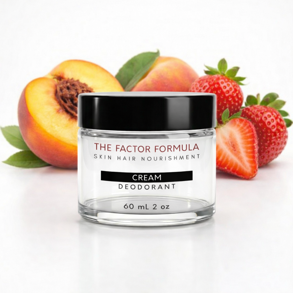 Jar of 'The Factor Formula' cream deodorant with peaches and strawberries on a white background